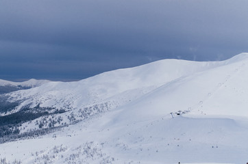 Winter snow covered mountain peaks in Europe. Great place for winter sports