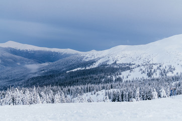 Winter snow covered mountain peaks in Europe. Great place for winter sports