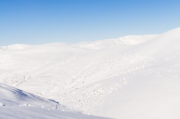 Winter snow covered mountain peaks in Europe. Great place for winter sports