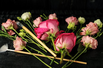 flowers with artistic brush on black background layout