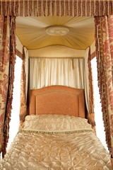 close up inside a four poster bed