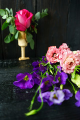 bouquet of flowers on black background layout