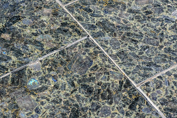 Background of the polished granite paving slabs