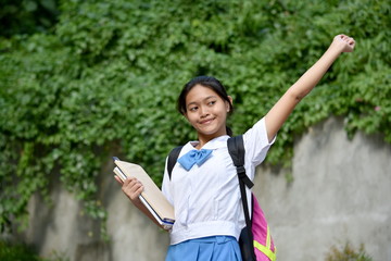 Youthful Minority School Girl And Happiness