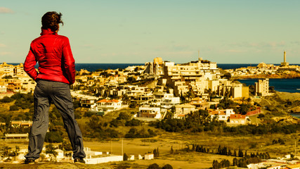 Tourist woman on sea coast in Spain