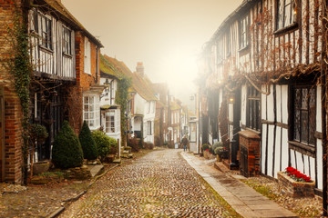 pretty Tudor half timber houses on a cobblestone street at Rye in West Sussex