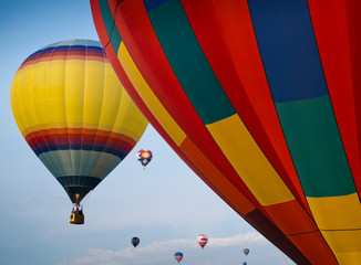 Obraz premium Colorful hot air balloons in the sky at the International Balloon Festival in Saint Jean Sur Richelieu, Quebec, Canada