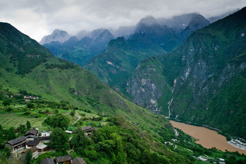 Fototapeta premium Tiger Leaping Gorge is a scenic canyon on the Jinsha River, a primary tributary of the upper Yangtze River in Yunnan province, southwest China. 