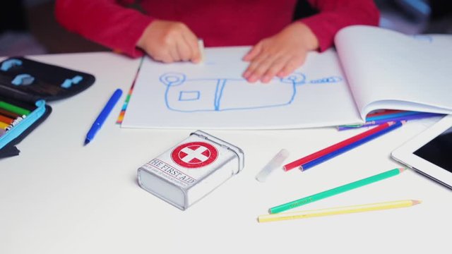 first aid box stands on a table in kindergarten