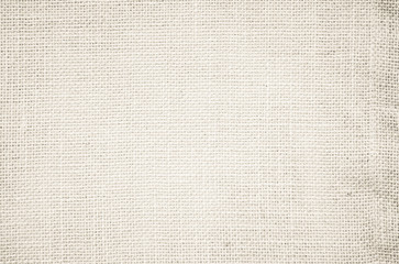 Fototapeta na wymiar Cream pastel texture background. Haircloth or blanket wale linen canvas wallpaper. Rustic canvas fabric texture in natural color. Natural vintage linen burlap fabric texture background.