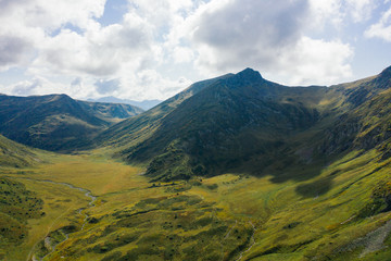 Fototapeta premium Beautiful aerial view on the summer mountain and forest