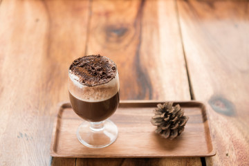 selective focus close up home made hot chocolate .Wood table top with chocolate in cafe  or (coffee shop,restaurant ) Selective focus background