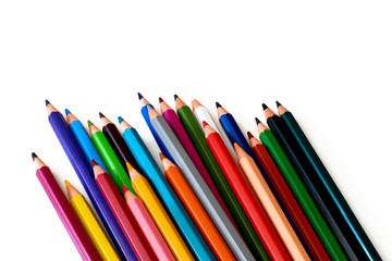 Close up of color pencils with different color isolated on white background