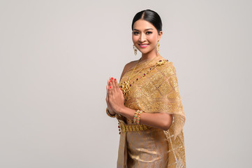 Women wearing Thai clothing that Pay respect,sawasdee symbol