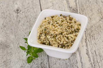 Peeled hemp seeds in the bowl