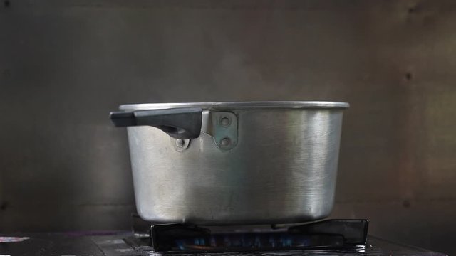 hot pot boil water vapour steam on gas stove