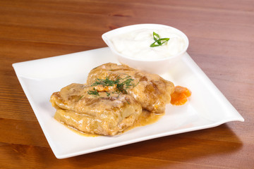 Homemade stuffed cabbage with cream