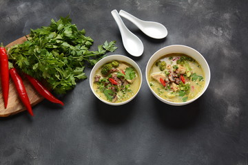 Traditional Thai cuisine, Thai Spicy Green curry chicken soup withcoconut milk, mushrooms and broccoli. Healthy food