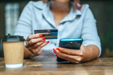 Payment for goods by credit card via smartphone.