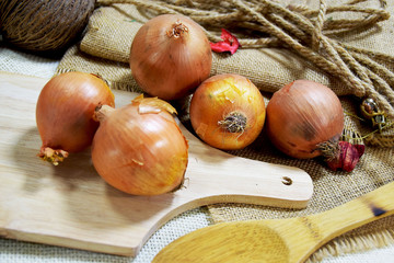 Onion, put on sackcloth,cutting board