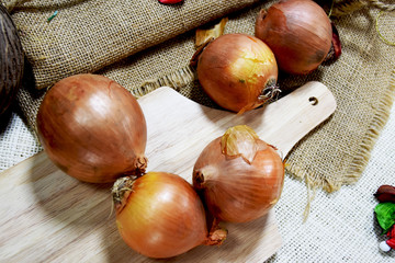 onion on woodern Butcher