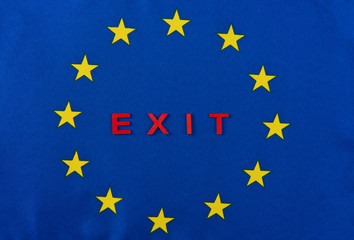 Close up of European Union flag with text exit