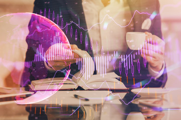 Double exposure of businessman with coffee with stock market forex chart.
