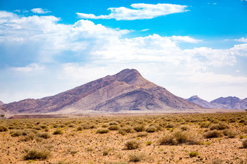 Fototapeta na wymiar Barren mountain in an arid landscape, Namib Naukluft Park, Namibia, Africa