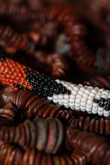 A close-up shot of African beads higlights the stunning detail, beautiful patterns and rich earthy colours of the African continent