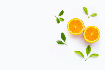 Fresh orange citrus fruit with leaves isolated on white background.