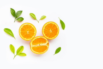 Fresh orange citrus fruit with leaves isolated on white background.