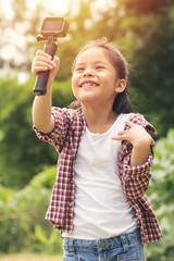 Portrait of child blogger girl review travel