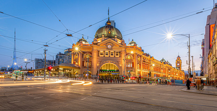 Melbourne Australia Flinders Street Station on the corner of Flinders Street and Swanston Street just after sunset