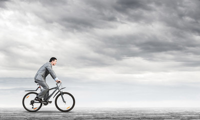 Businessman commuting to work by bike