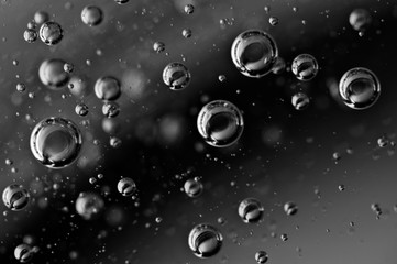 The movement of air in the water. Macro. Black and white. For eco concepts or drinks, liquids with...