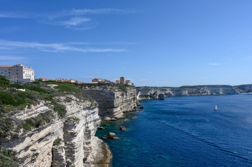 Obraz na płótnie Canvas Panoramic view of the white limestone cliffs and Bonifacio Corsica. Sea and blue sky