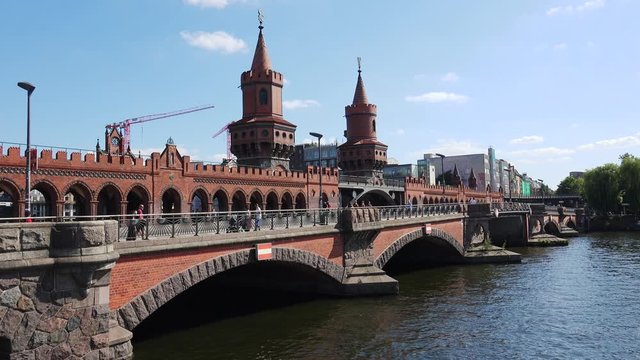 Oberbaum Bridge, Oberbaumbrucke, River Spree. Berlin. Germany. 4K.