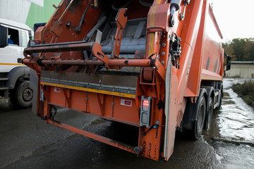 Red Garbage Truck on the city road. © Семен Саливанчук