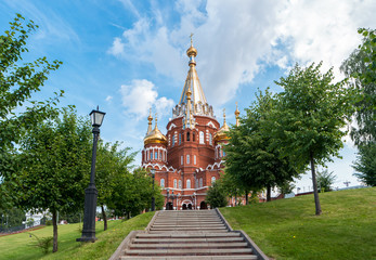 Fototapeta na wymiar View of the towers and domes of the Orthodox Church. The St. Michael's Cathedral in the city of Izhevsk, Russia.