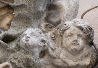Angels, statue on the house facade in Graz, Styria, Austria 