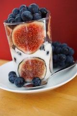 yogurt with fresh berries,figsand grapes