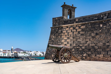 An cannon on the old fortress (Castillo de San Gabriel), off the coast from Arrecife, Lanzarote, Spain