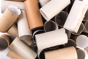 Cardboards sleeve from rolls of toilet paper. Out of toilet paper. Recycled cardboard cylinders from toilet paper. Close-up of empty toilet rolls.