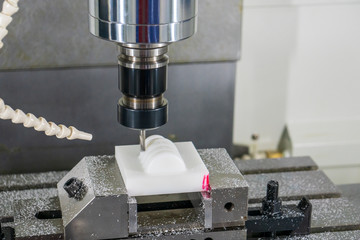 The CNC milling machine hi-precision cutting the plastic parts by solid ball endmill tool. The jig...