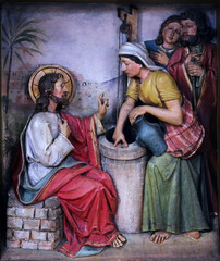 Fototapeta premium Jesus and the Samaritan Woman, relief in the church of Saint Martin in Zagreb, Croatia