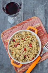 tabbouleh in small dish on ceramic background