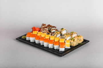 japanese national food, sushi on light background