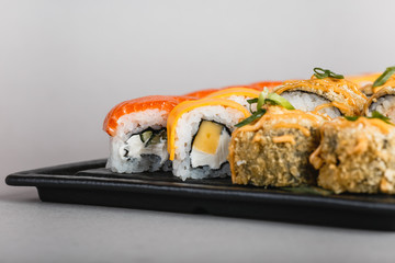 japanese national food, sushi on light background