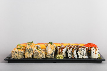 japanese national food, sushi on light background