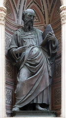 Fototapeta premium Saint John the Evangelist by Baccio da Montelupo, Orsanmichele Church in Florence, Tuscany, Italy